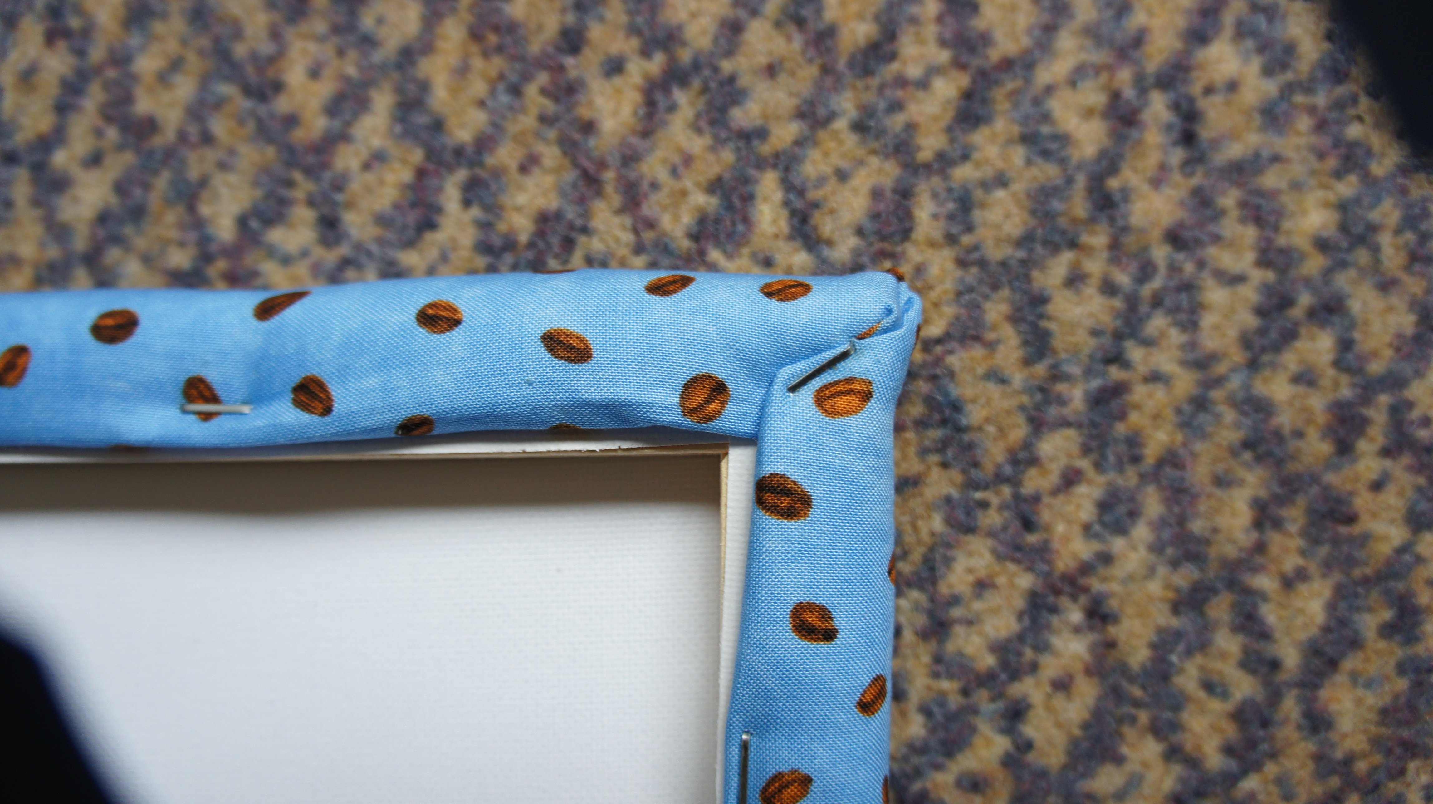 Corner of fabric pinboard