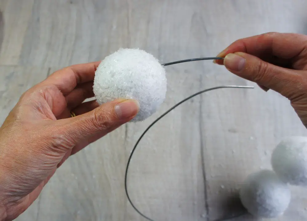 Putting snowball on wire