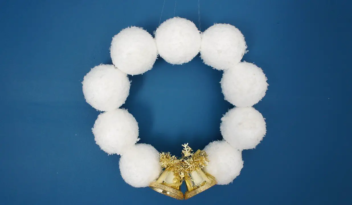snowball wreath on blue background