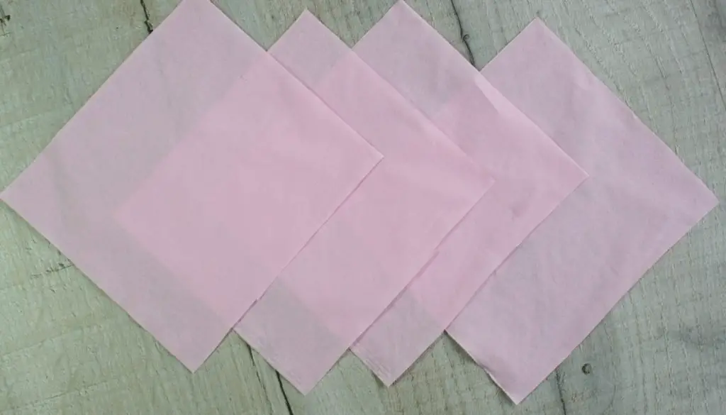 Squares of tissue paper