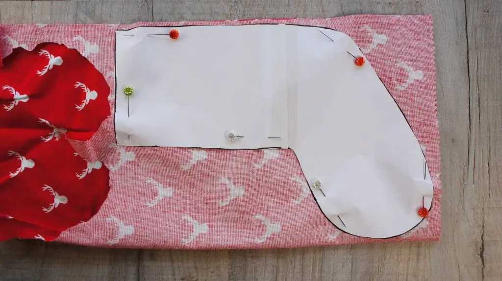 Christmas stocking template pinned to fabric