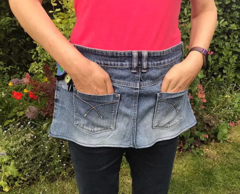denim apron from upcycled jeans being worn