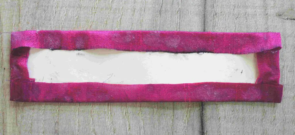 rectangle of card in lining fabric
