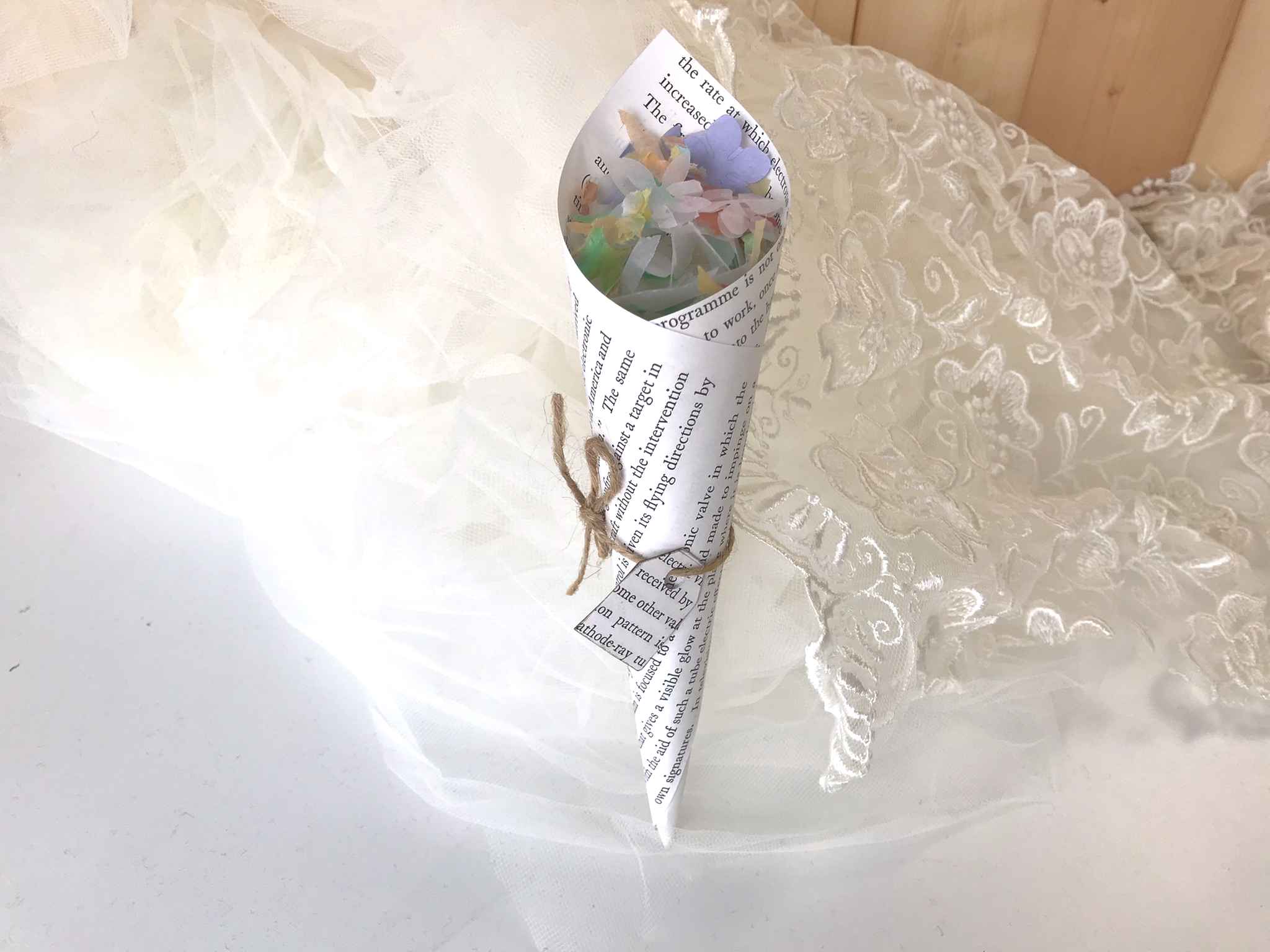 old book page confetti cone