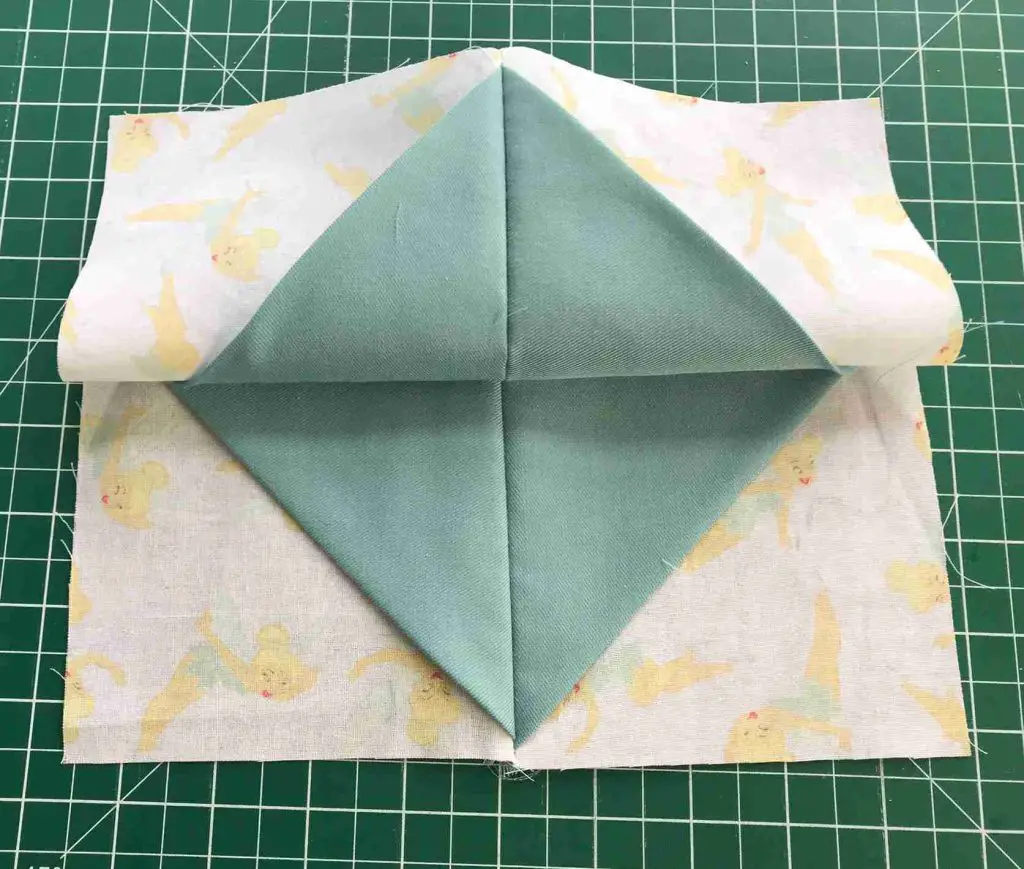 four squares of cathedral window patchwork