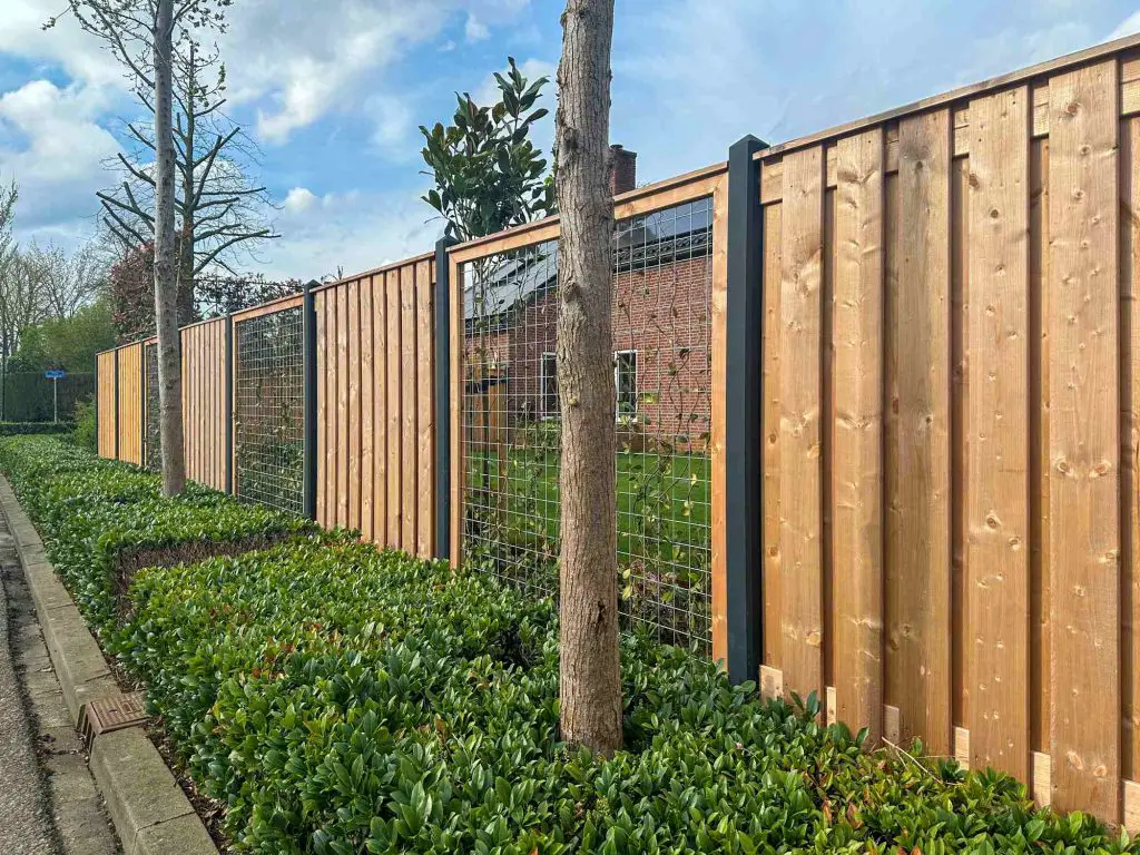 timber fencing and mesh screen