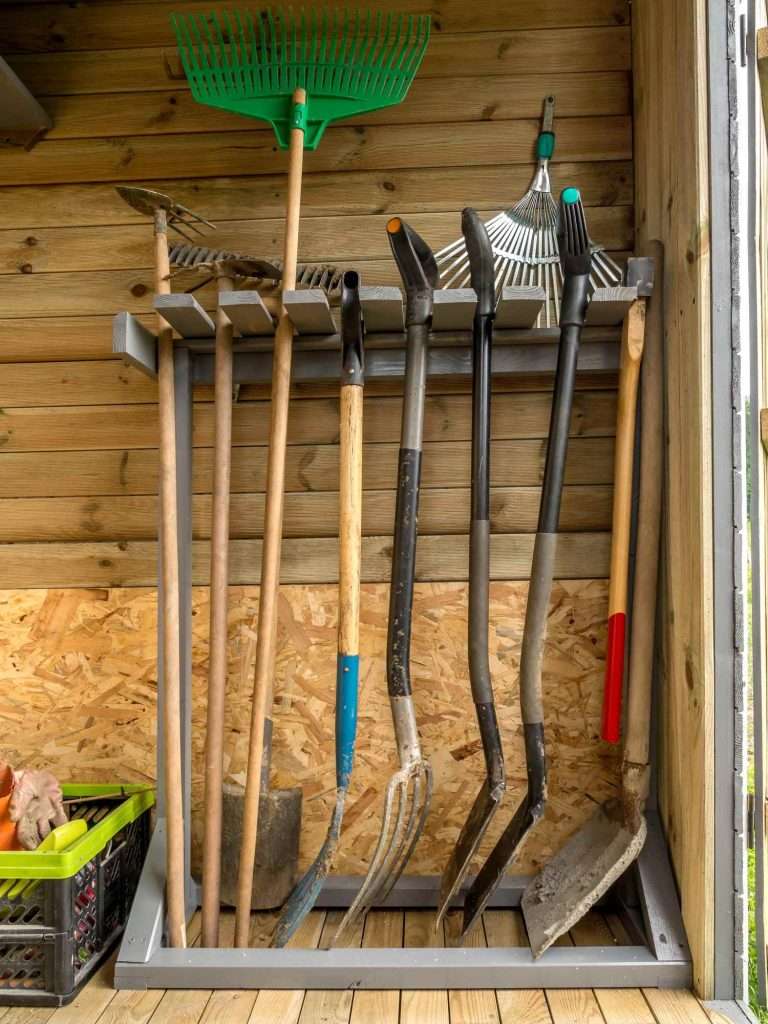 garden tool storage with tools in place