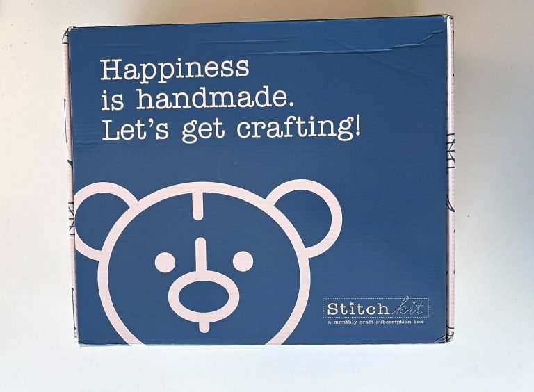 blue stitch kit box with cute bear image on it