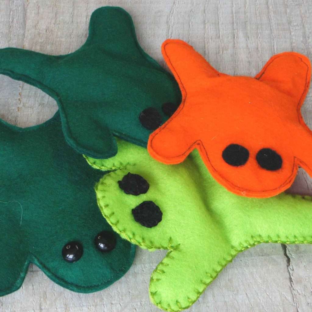 beanbag frogs header image square with 4 beanbags in greens and orange