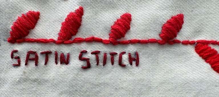 red satin stitched leaves