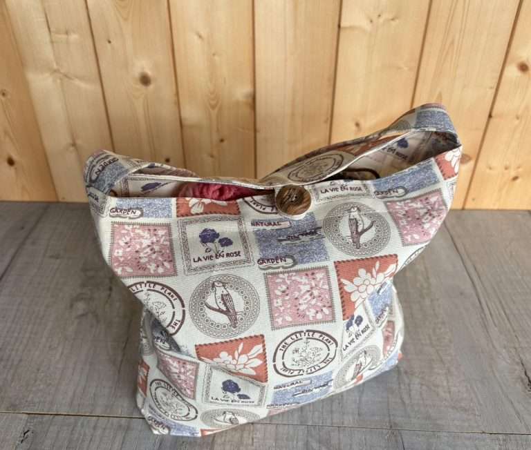 full boxed bottom bag on desk