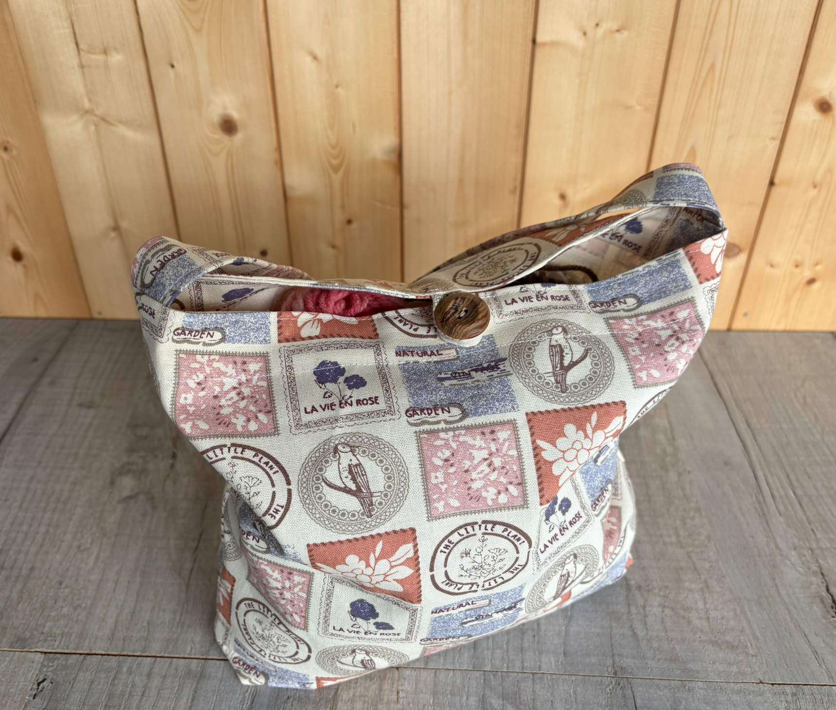 full boxed bottom bag on desk