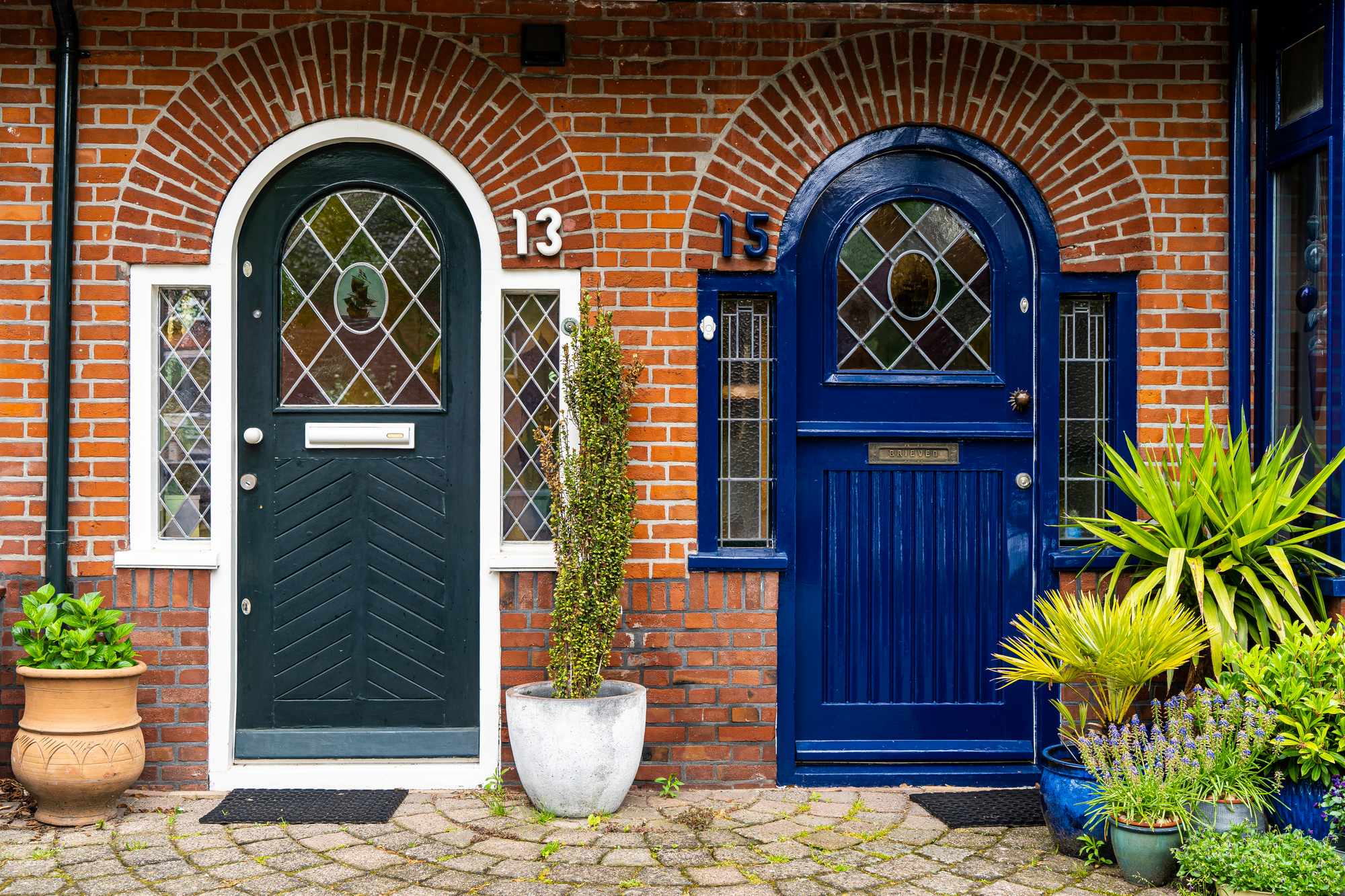 2 front door son a city street